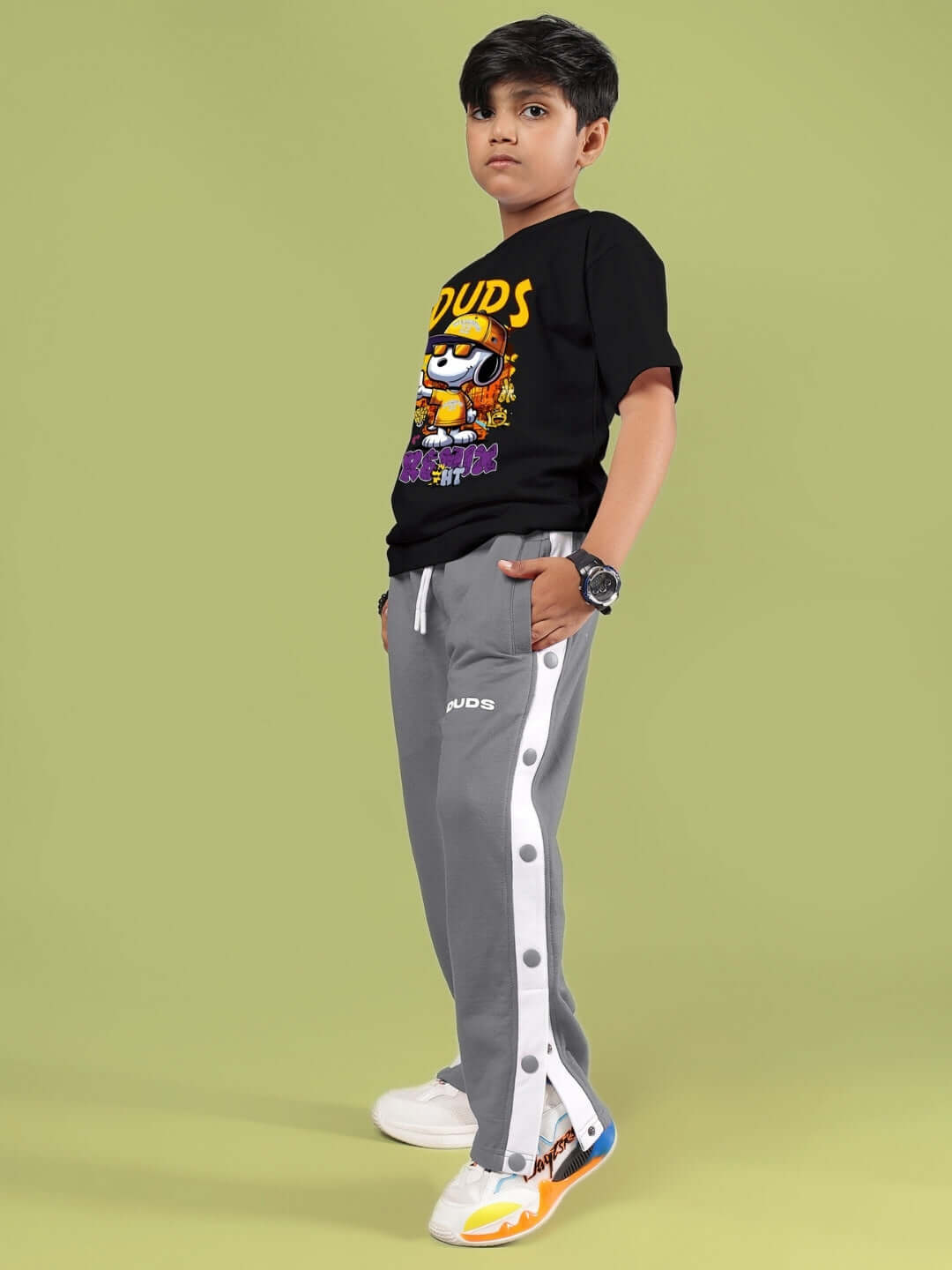 SNOOPY RIMIX CO-ORD FOR BOYS & GIRLS BLACK GREY outfit modeled by a child on a green background, featuring stylish top and pants.