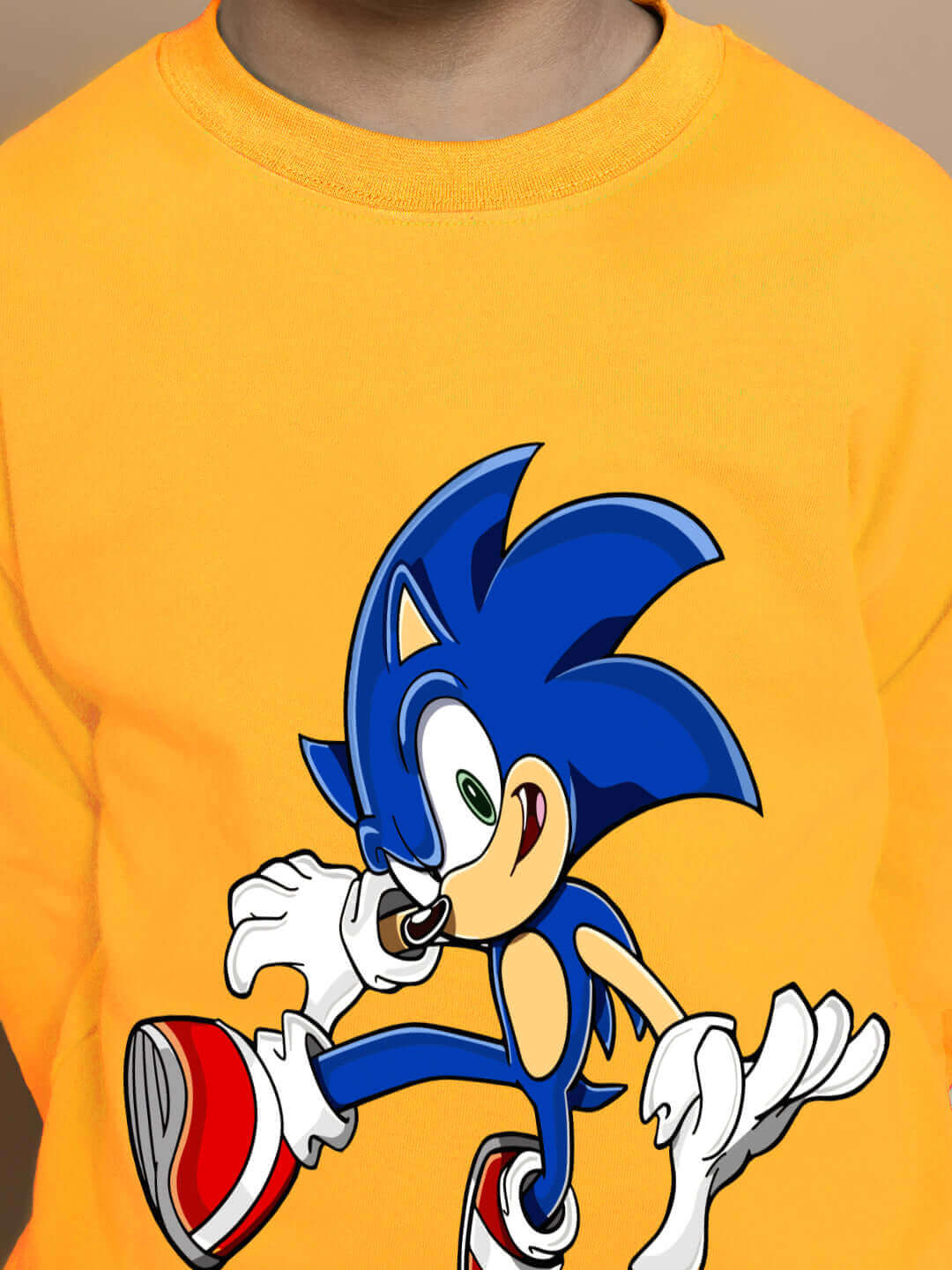 Bright yellow Sonic co-ord for kids with blue cartoon character design.