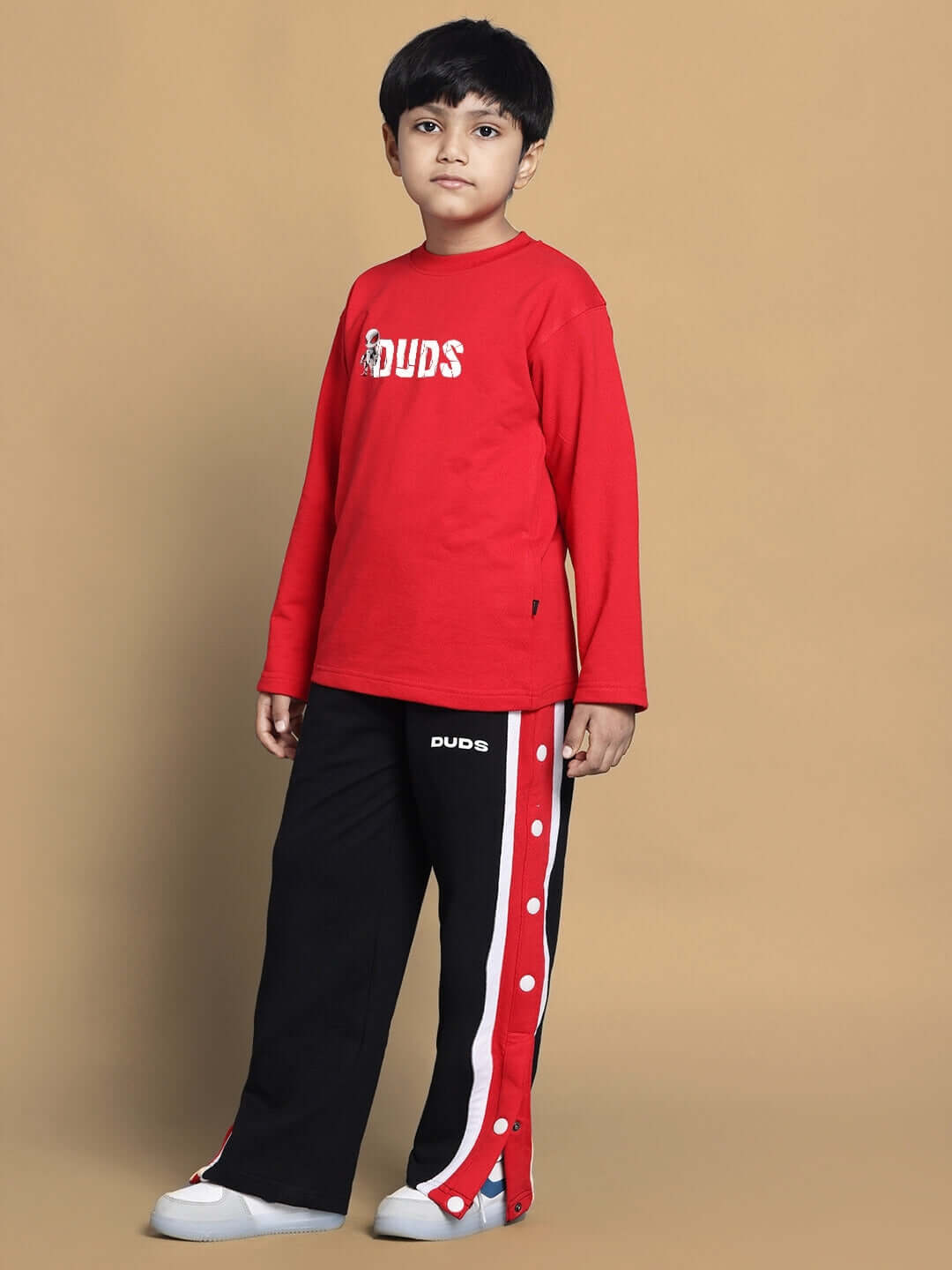 Child wearing SPIDERROBO red co-ord set by DUDS, featuring customizable fit and shipping within 7-10 days.