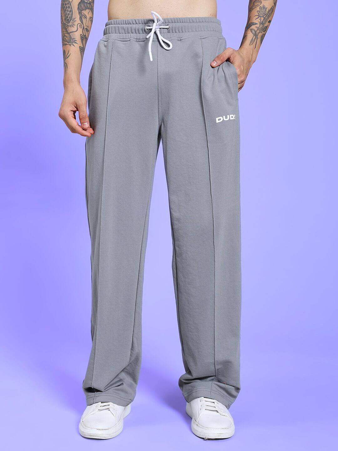 SPIRAL RELAXED-FIT JOGGERS GREY showcasing relaxed fit and spiral detail on a model