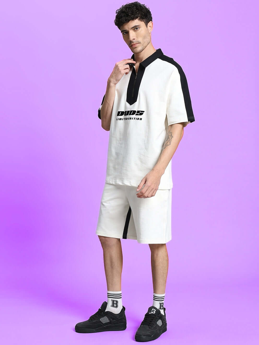 Model wearing SPLINTER Summer Co-Ord Set in off white, made from premium heavy gauge fabric, featuring 97% cotton and 3% elastane.