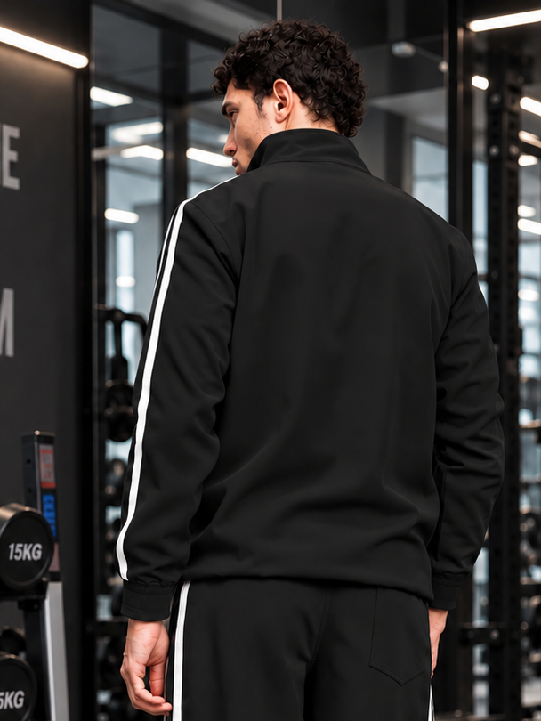 SPORTY ZIP UP RELAXED FIT JACKET BLACK worn by man in gym, back view showing stripe design