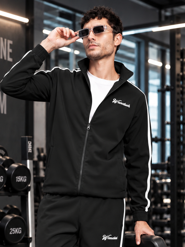 SPORTY ZIP UP RELAXED FIT JACKET BLACK worn by man in gym with sunglasses and white stripe detail