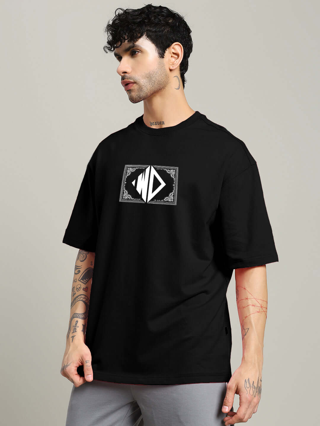 Model wearing black square frame oversized t-shirt made from premium cotton French terry by Color By Colours.
