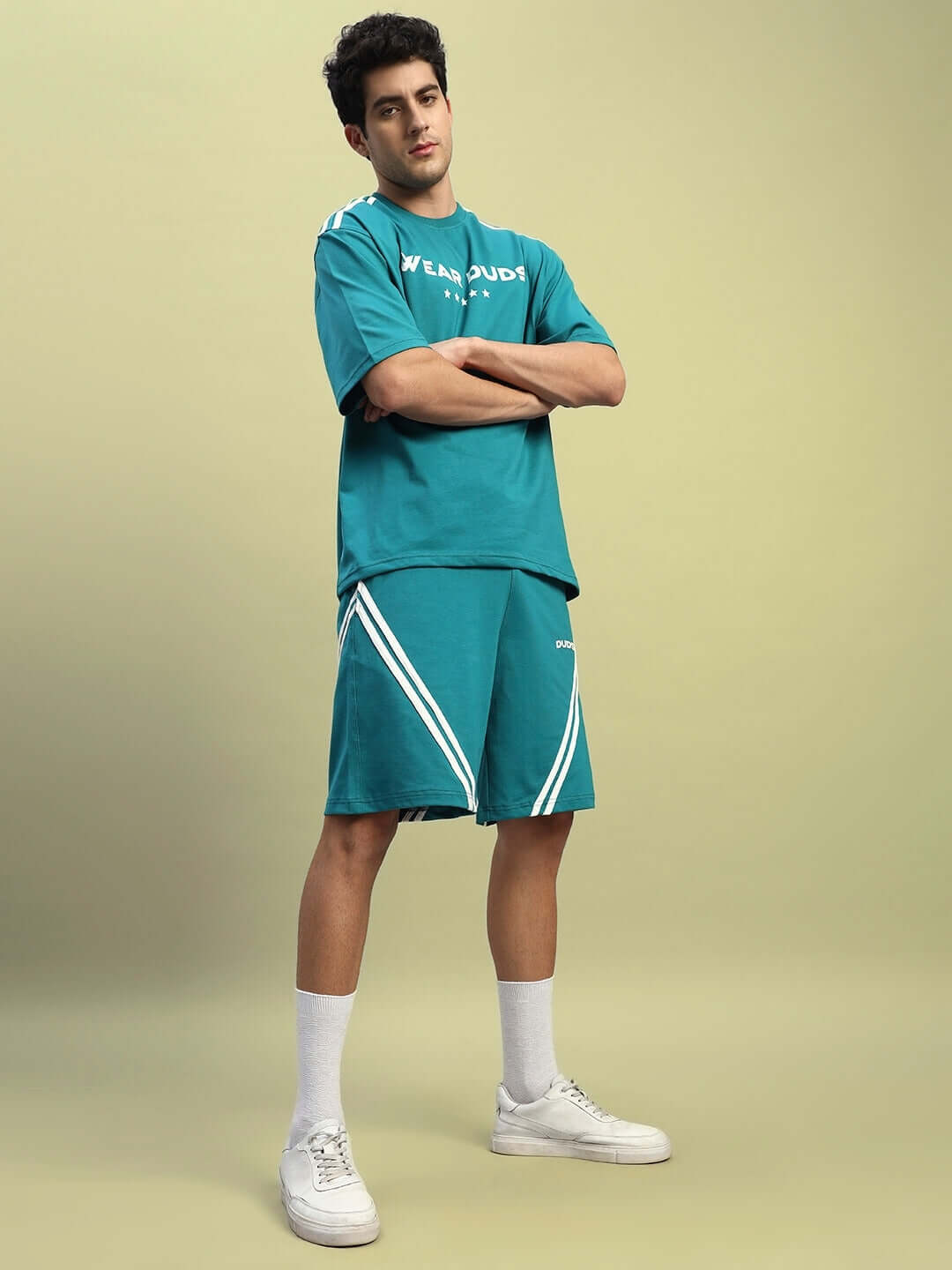 Teal STAR JUMPER SUMMER CO-ORD SET featuring premium cotton French Terry Lycra, worn by a man against a neutral background.