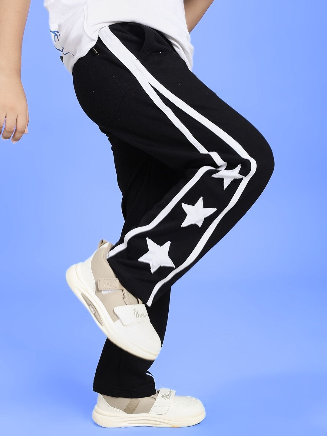 STELLAR RELAXEDFIT JOGGER FOR BOYS AND GIRLS BLACK with white star design on side