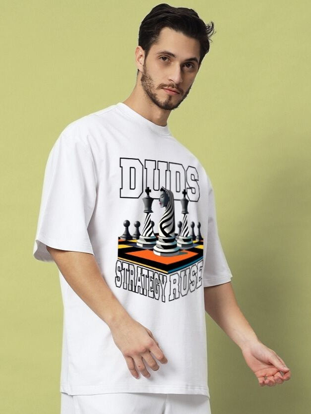 Model wearing STRATEGY RUSE OVER-SIZED T-SHIRT WHITE featuring chess design