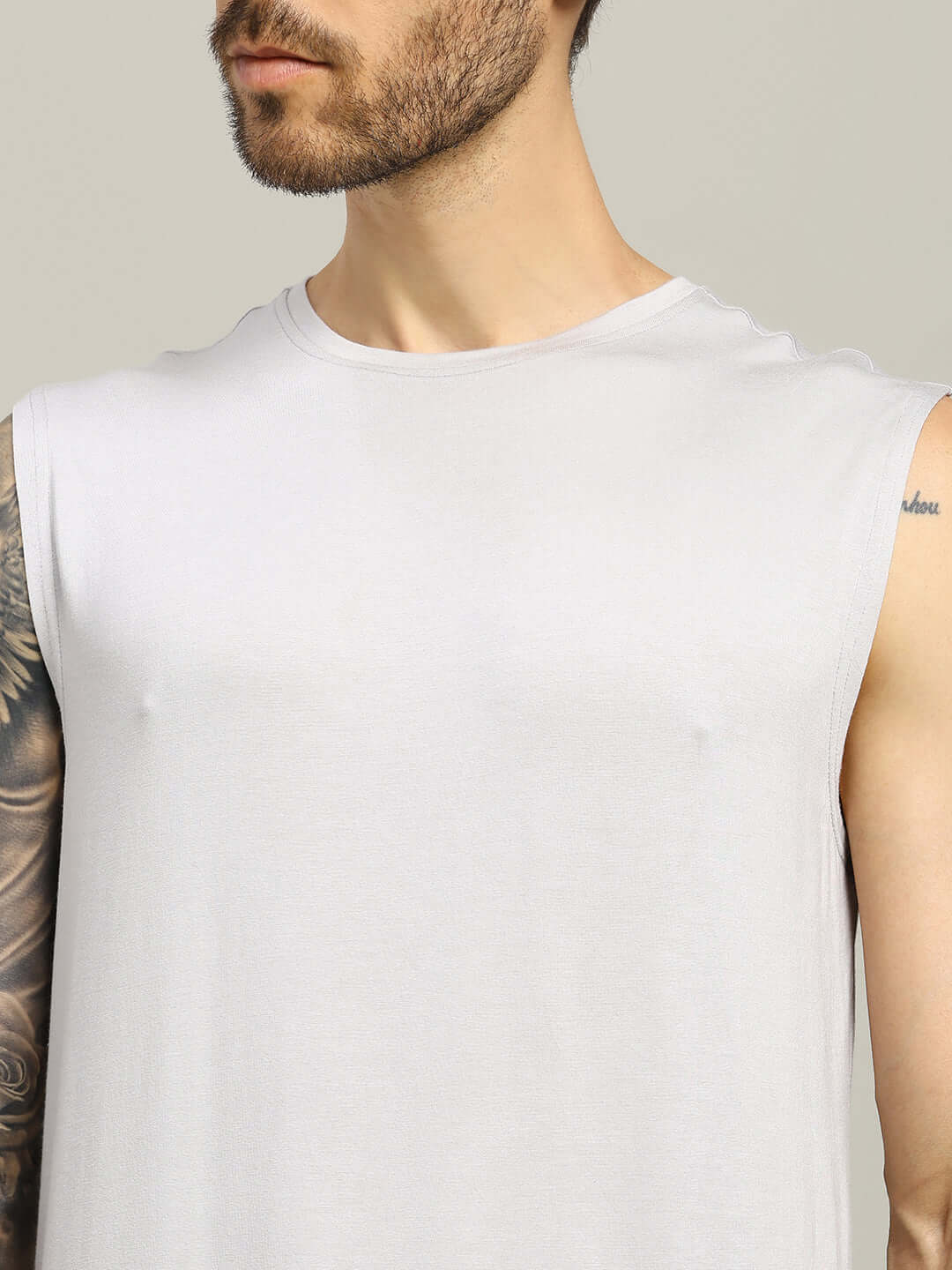 STRENGTH FREAK FITNESS T-SHIRT LIGHT GREY - breathable cotton t-shirt modeled by man, perfect for summer