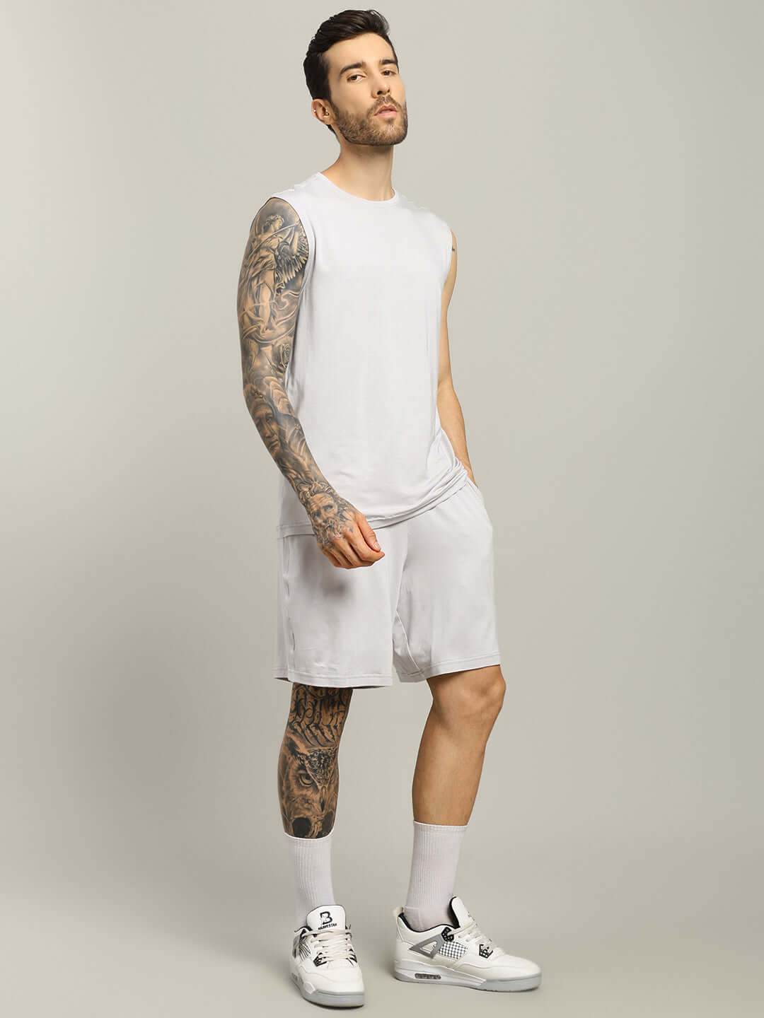 Man wearing STRENGTH FREAK CO-ORD SET LIGHT GREY for athleisure style