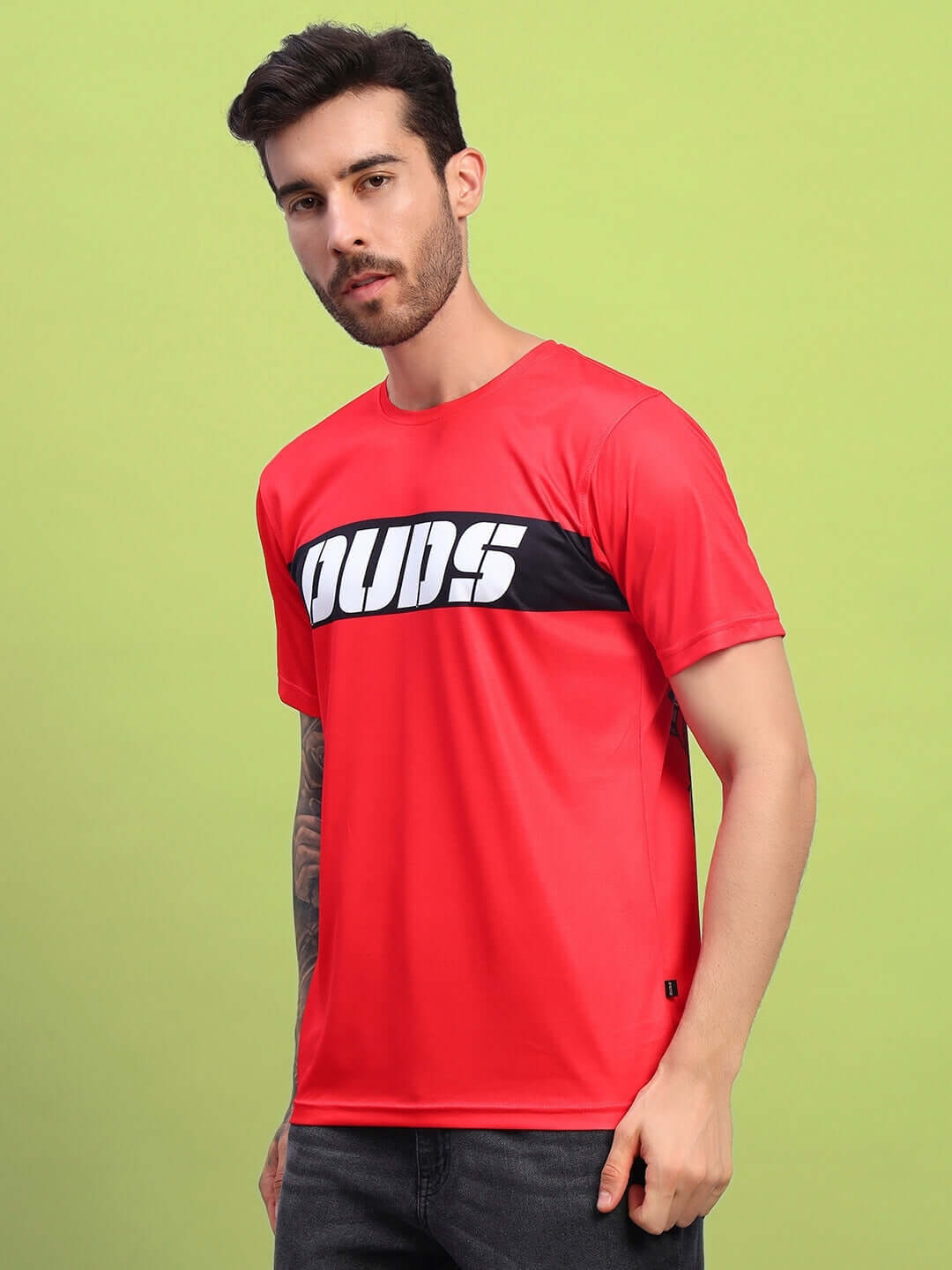 Man wearing stylized red leopard printed t-shirt, sports polyester, cold machine wash care from Color By Colours, India.