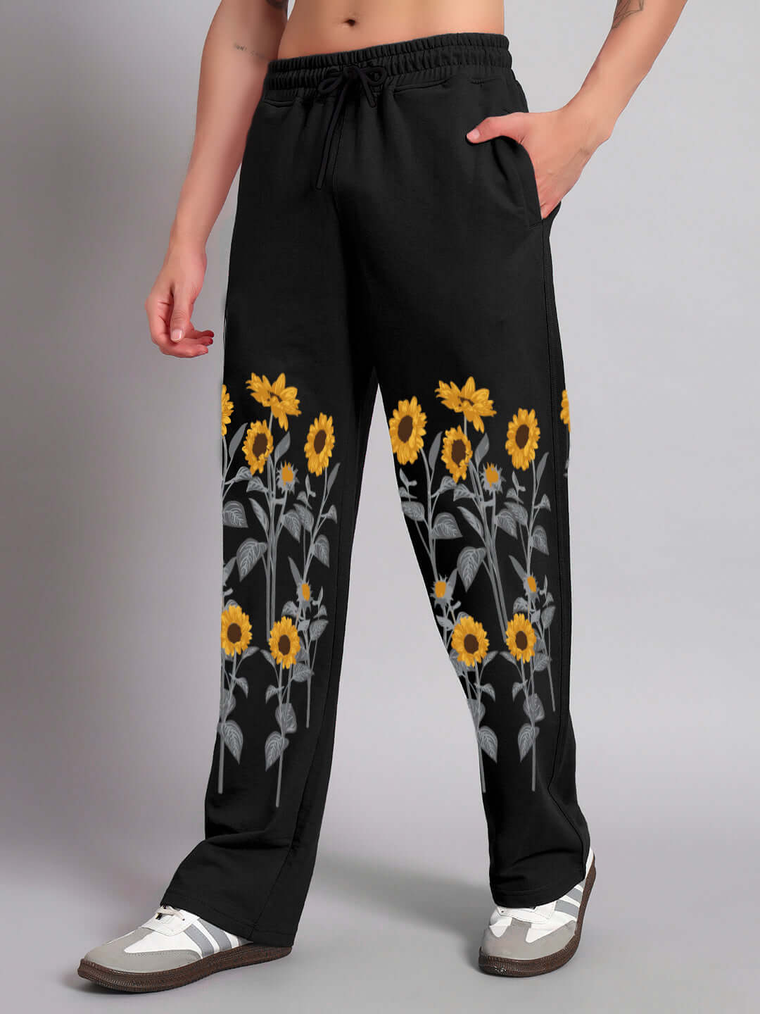 SUNFLOWER RELAXED-FIT JOGGER BLACK with subtle sunflower detailing displayed for stylish and comfortable wear.