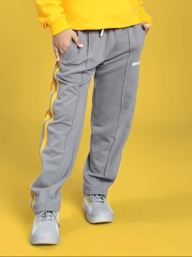SUNSHINE STRIPE JOGGER FOR BOYS AND GIRLS RED GREY with yellow stripe design, featuring comfortable fit and casual style.