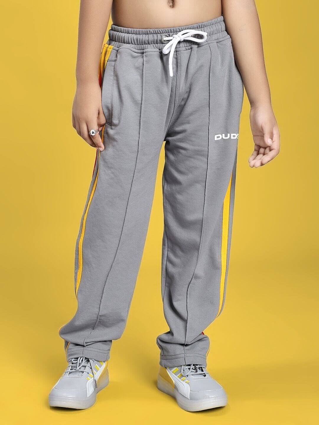 SUNSHINE STRIPE JOGGER FOR BOYS AND GIRLS RED GREY with yellow stripe detail.