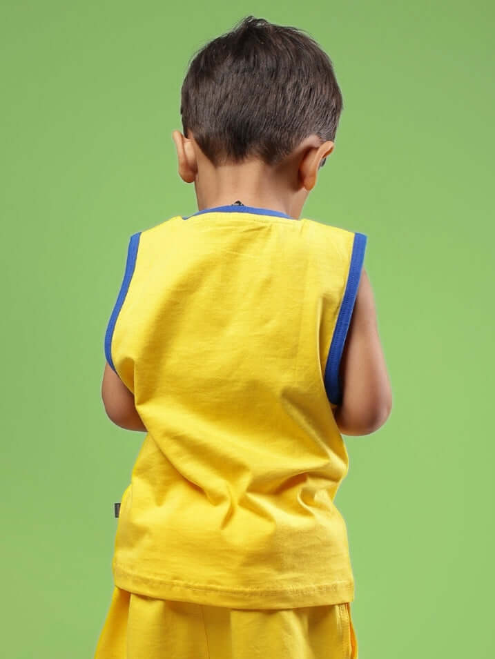Child wearing SUPER HERO T-SHIRT FOR BOYS & GIRLS YELLOW, showcasing playful superhero-inspired print and vibrant color.