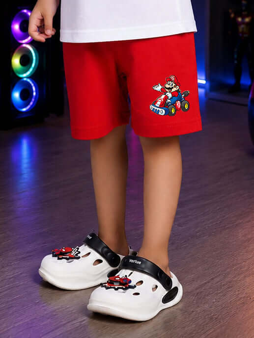 A child wearing SUPER MARIO COOL SHORTS FOR BOYS GIRLS RED and white clogs, showcasing a vibrant and playful outfit.
