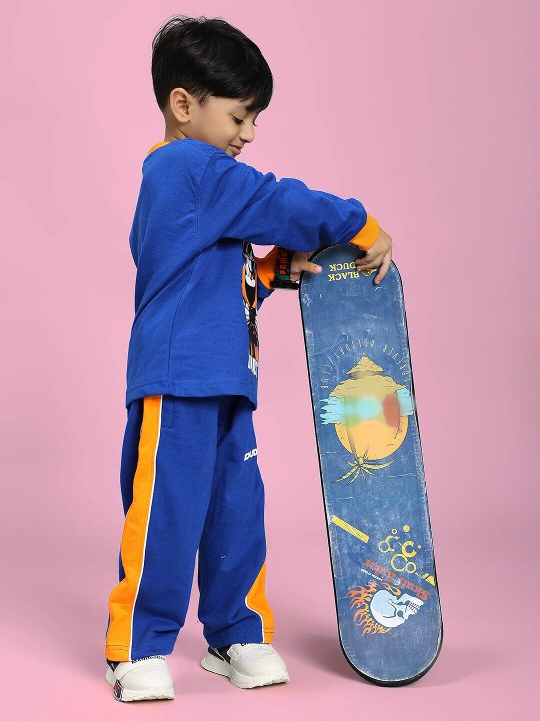 Child wearing Super Saiyan Sweatshirt for Boys and Girls Blue holding a skateboard, showcasing playful and energetic style.
