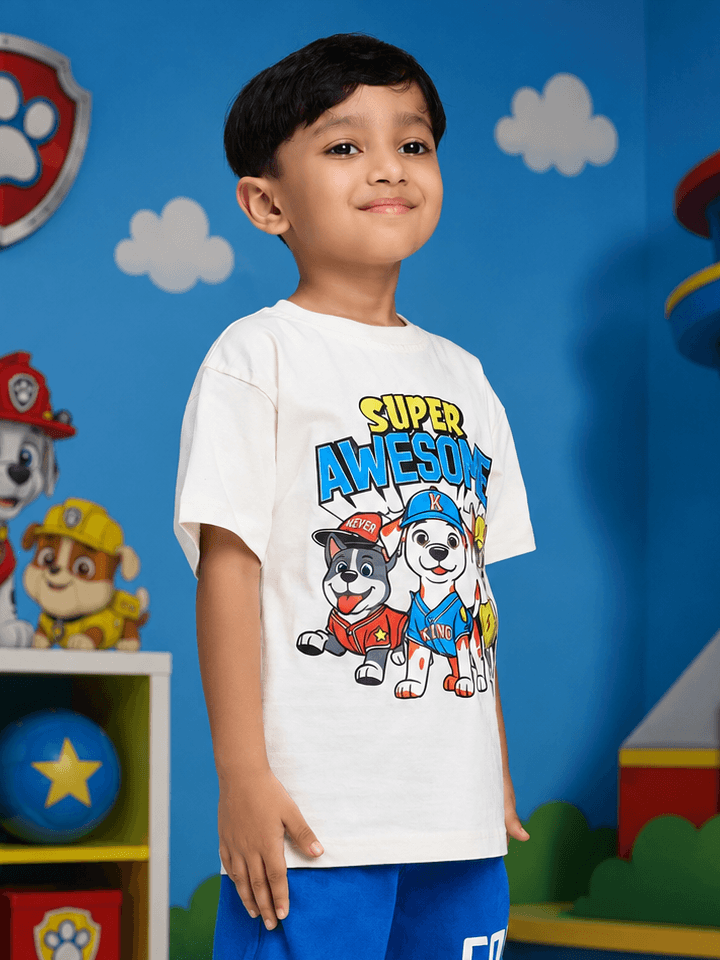 SUPER SQUAD T-SHIRT FOR BOYS GIRLS WHITE worn by a young boy in a colorful room with character design.