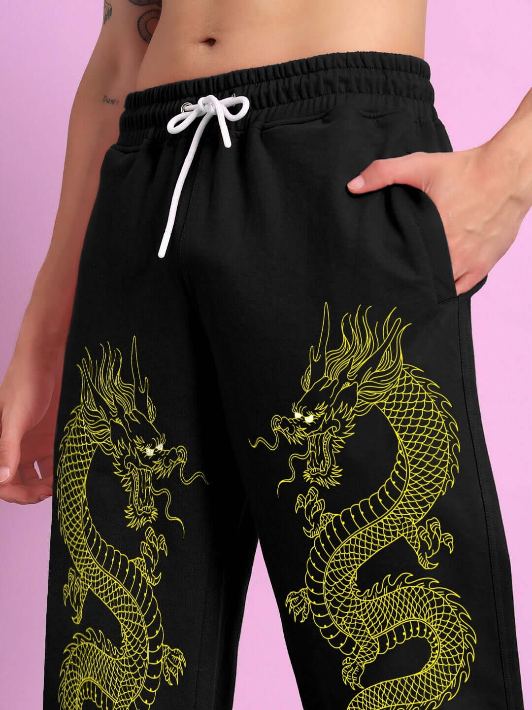 SUPREME DRAGON PRINTED RELAXED FIT JOGGER BLACK features bold dragon print on black joggers with premium cotton blend fabric, streetwear style.