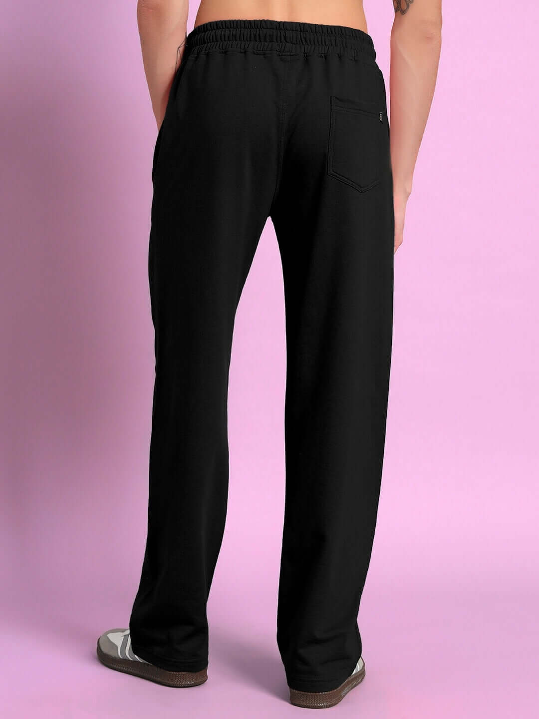 Back view of SUPREME DRAGON PRINTED RELAXED FIT JOGGER BLACK showcasing comfort and style.