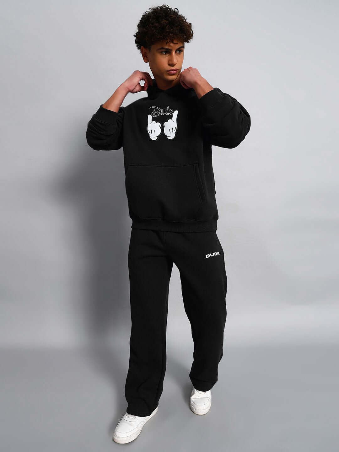 Model wearing WEARDUDS SUPREME FLEECE CO-ORD BLACK, showcasing stylish design made by experienced tailors. Available in custom fit.