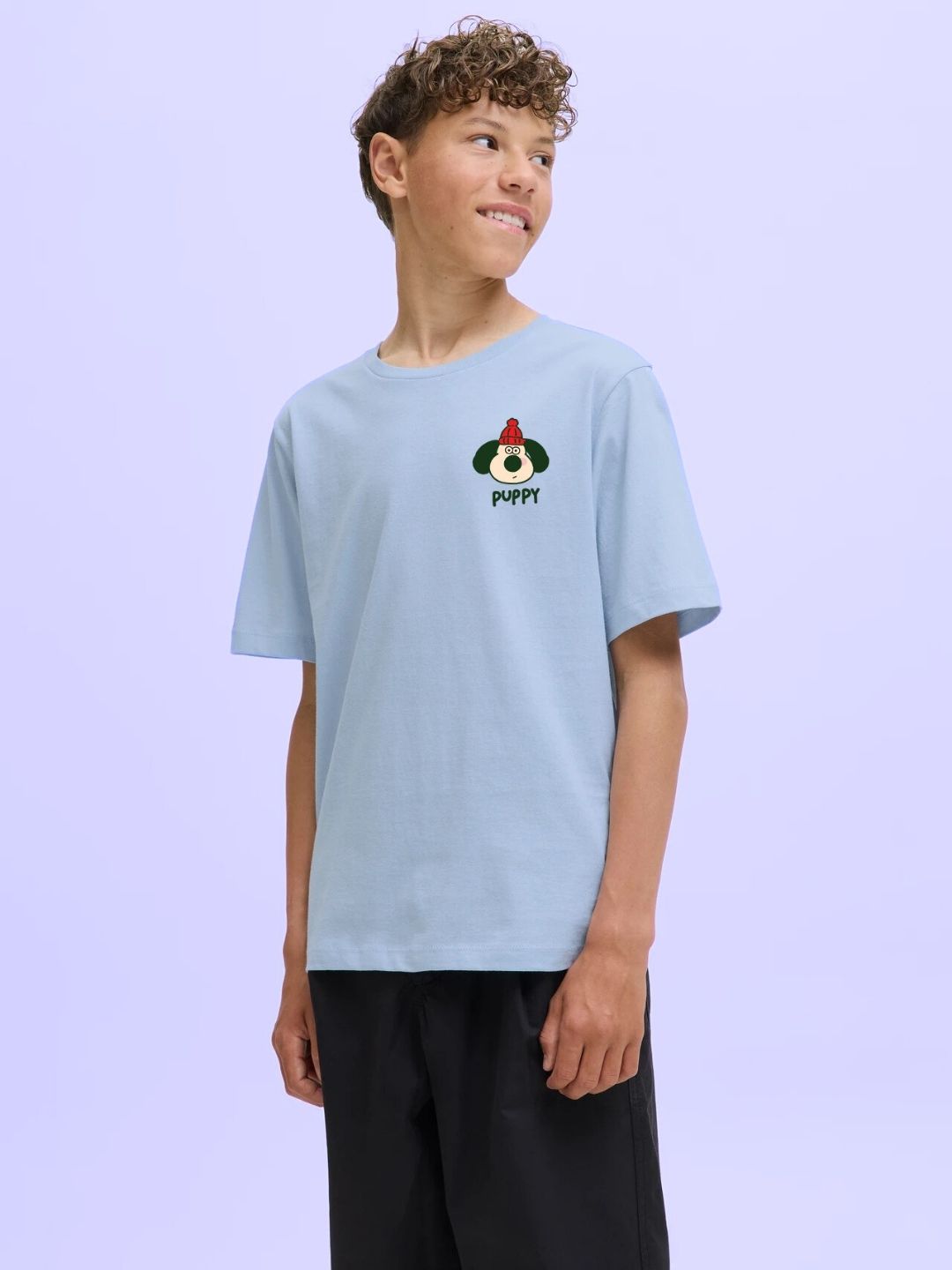 TADDY PUPPY T-SHIRT FOR BOYS AND GIRLS SKY BLUE worn by a young boy, featuring a cute puppy design.