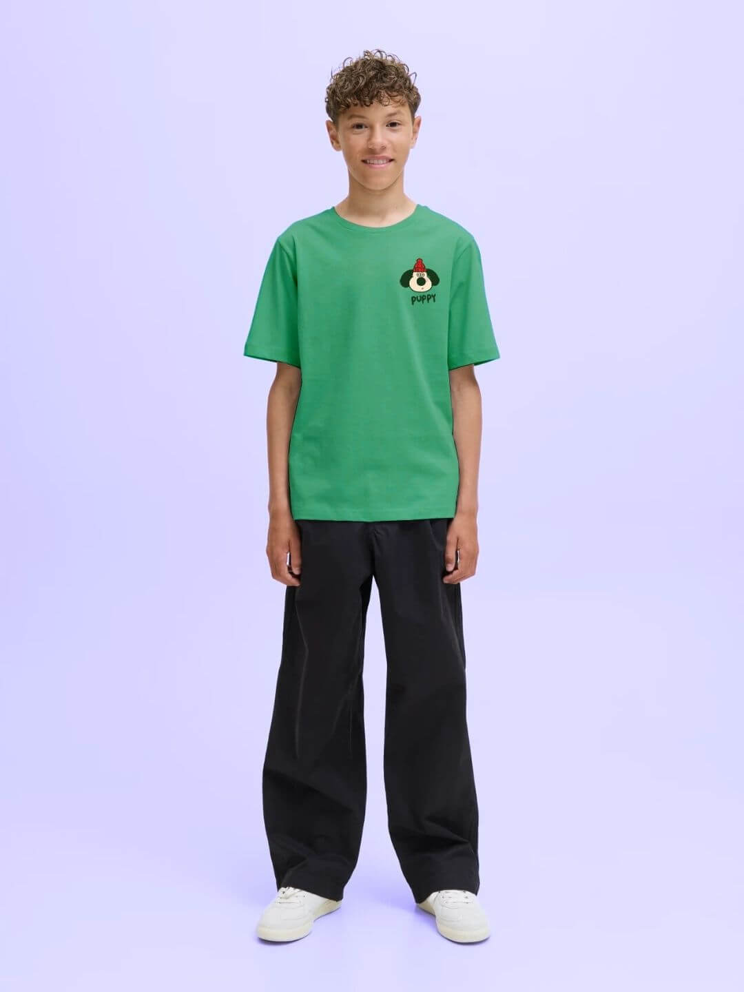 Boy wearing TADDY PUPPY T-SHIRT FOR BOYS AND GIRLS GREEN, showcasing a playful and stylish design for kids in a refreshing green shade.
