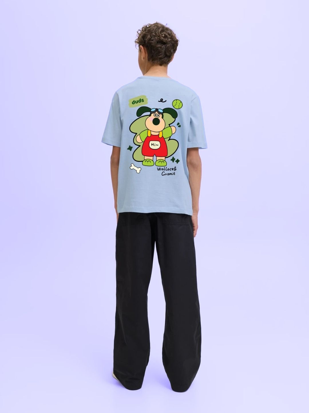 Child wearing TADDY PUPPY T-SHIRT FOR BOYS AND GIRLS SKY BLUE with cartoon character design on back