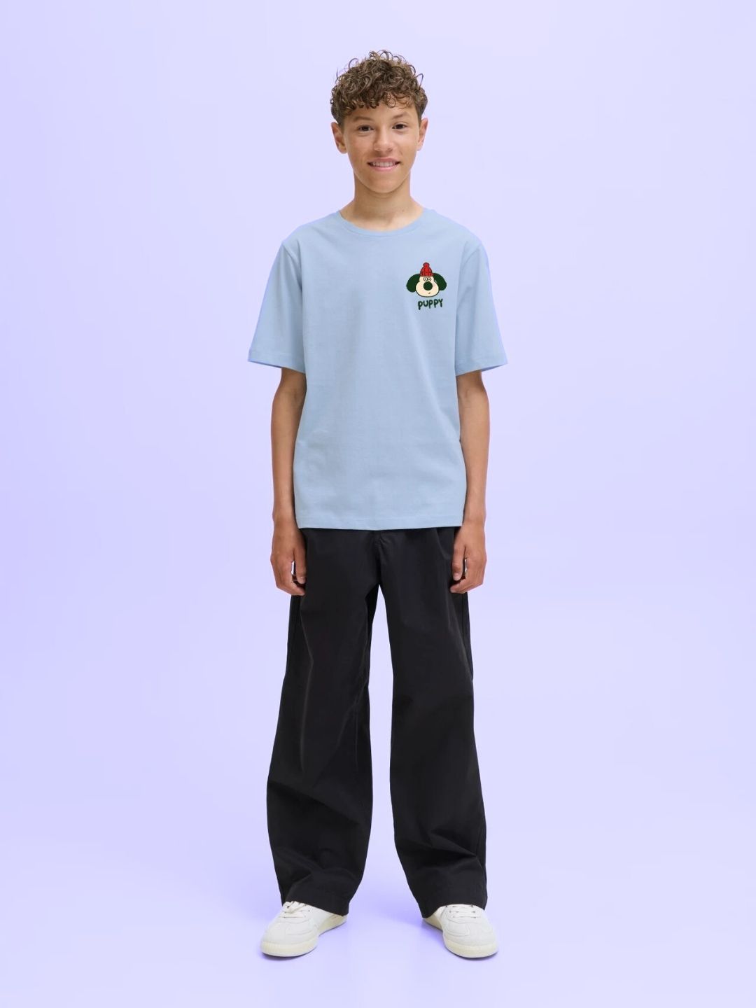 TADDY PUPPY T-SHIRT FOR BOYS AND GIRLS SKY BLUE worn by a model, showcasing casual fashion for children.