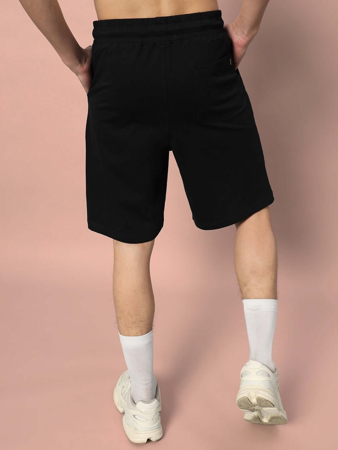 Back view of TAKE OFF regular fit black shorts, perfect for casual wear. Available with custom fit option by DUDS.