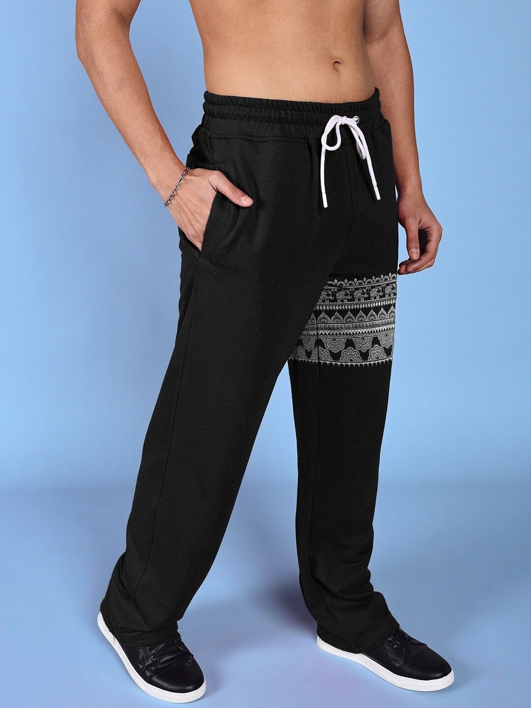 THAI TRADITIONAL PRINTED RELAXED FIT JOGGER BLACK with intricate Thai patterns.