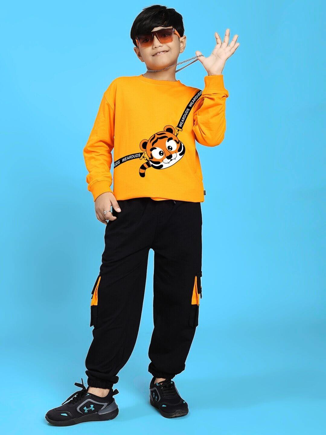 Child wearing TIGON KIDS JOGGER FOR BOYS AND GIRLS RED BLACK, showcasing vibrant red and black style for active children.