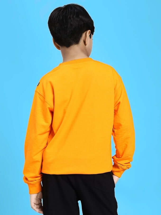 Boy wearing TIGON KIDS SWEATSHIRT FOR BOYS AND GIRLS ORANGE, back view, vibrant orange color, comfortable fit for kids.