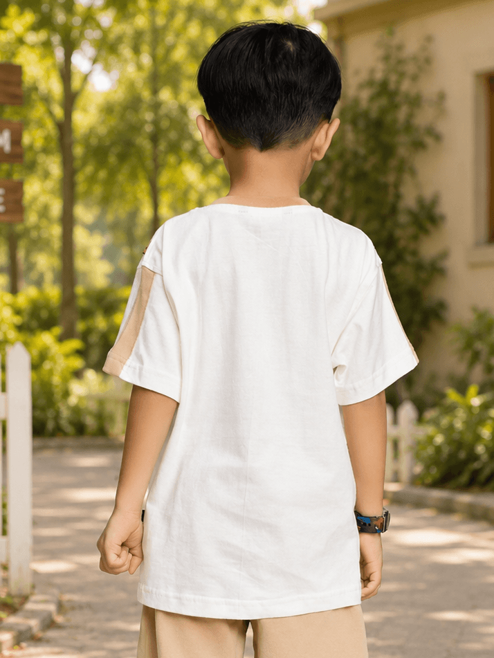 TINY TREND BEAR T-SHIRT FOR BOYS GIRLS WHITE, back view of a child wearing a white tee in a park.