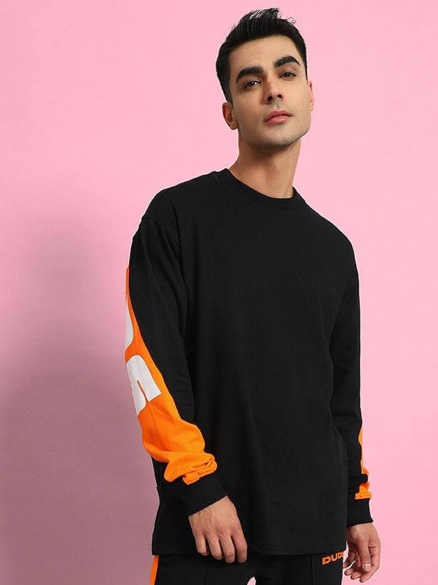 Unisex black oversized co-ord set with orange and white detailing, perfect for relaxed fit, featuring premium cotton and elastane blend.