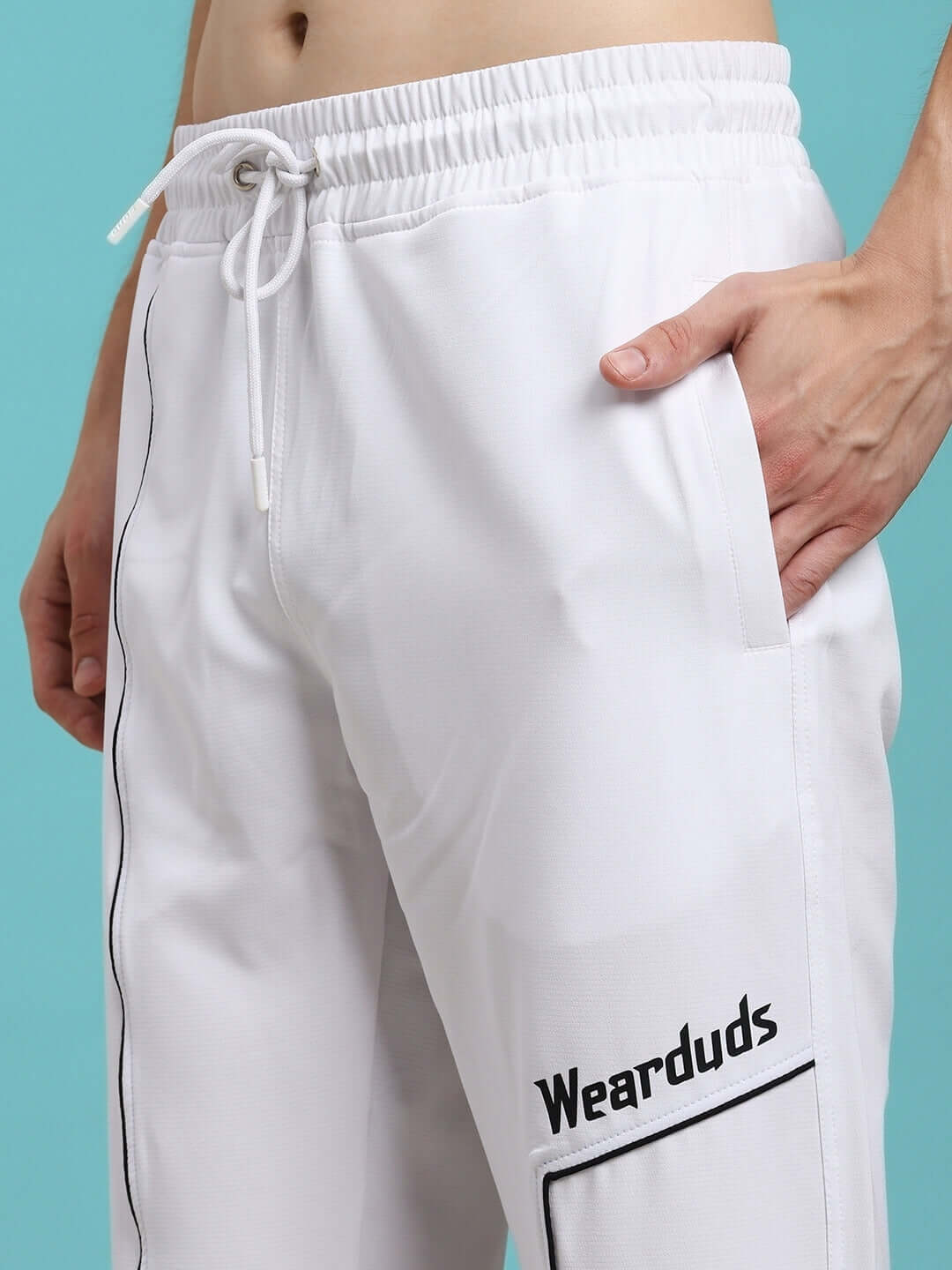 TOKYO RELAXED FIT JOGGERS WHITE men's joggers with drawstring waist and side pocket detail.