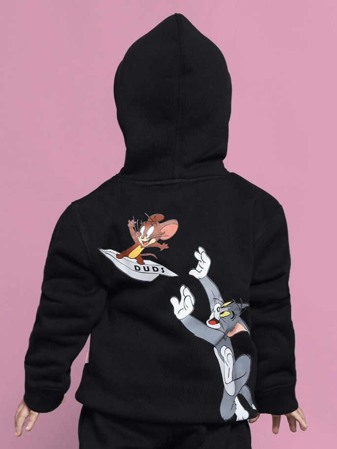 Kids black oversized hoodie featuring Tom and Jerry cartoon design on back, suitable for boys and girls.