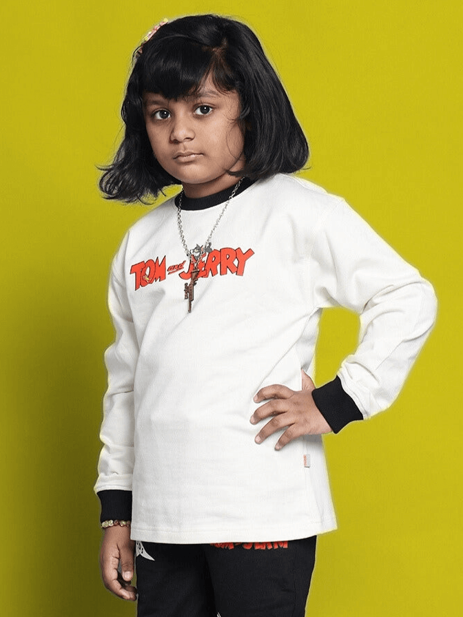 Child wearing Tom & Jerry oversized off-white-black sweatshirt, premium 100% cotton terry with bio-wash, suitable for boys and girls.