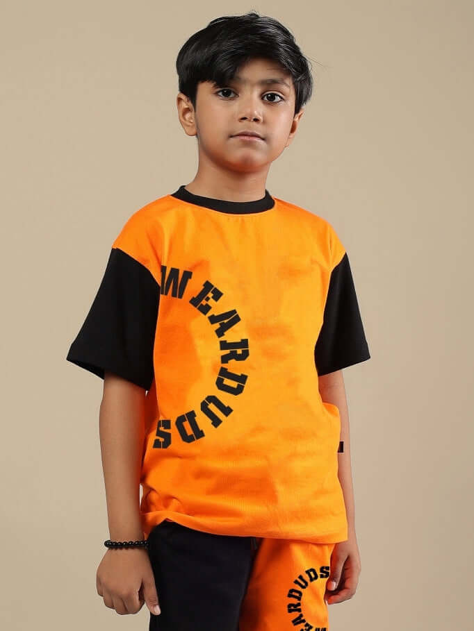 TRACK & FIELD T-SHIRT FOR BOYS & GIRLS BLACK-ORANGE Track & Field T-shirt for boys and girls in black and orange, featuring stylish lettering. Made to order by experienced tailors.