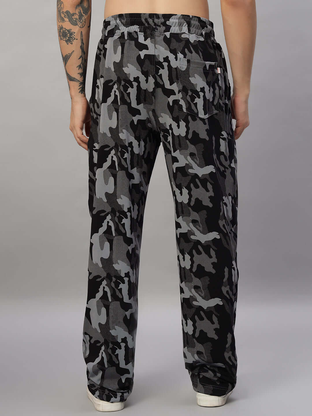 Back view of TRENCH CO-ORD SET CAMOUFLAGE NAVY pants with four-way Lycra and polyester-spandex blend.