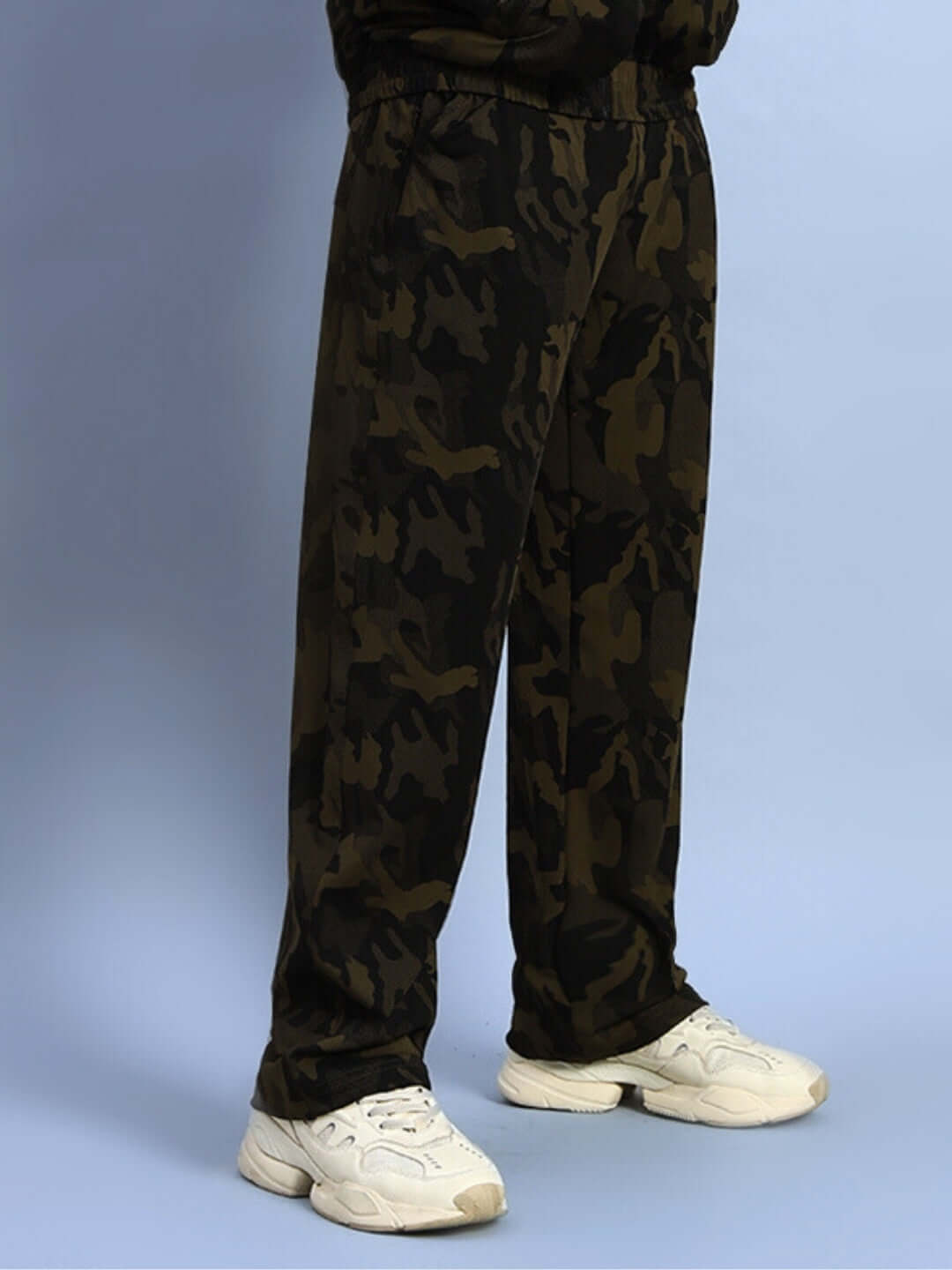 Camo green Trench Relaxed Pant Jogger with white sneakers, showcasing a casual, comfortable fit.