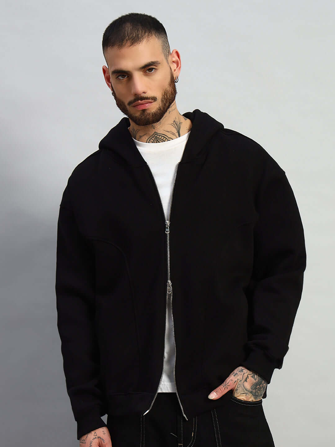 Model wearing WEARDUDS TWO FOLD ZIPPER HOODIE BLACK, showcasing the stylish made-to-order design. Perfect for custom fit options.