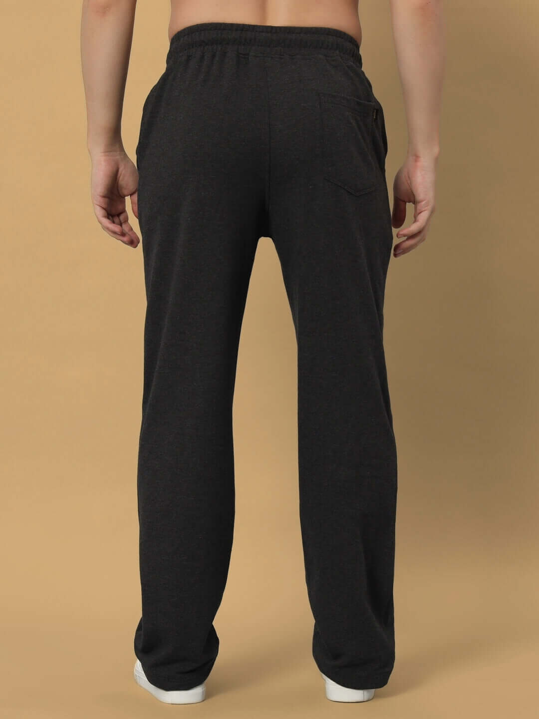 Back view of Umbra Relaxed Fit Joggers in grey, showcased on a model, highlighting the comfortable and stylish design.