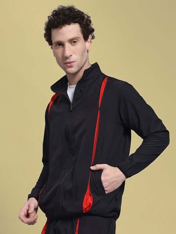 Man wearing UNISON RELAXED FIT JACKET BLACK RED, stylish casual jacket with red accents for versatile everyday wear.