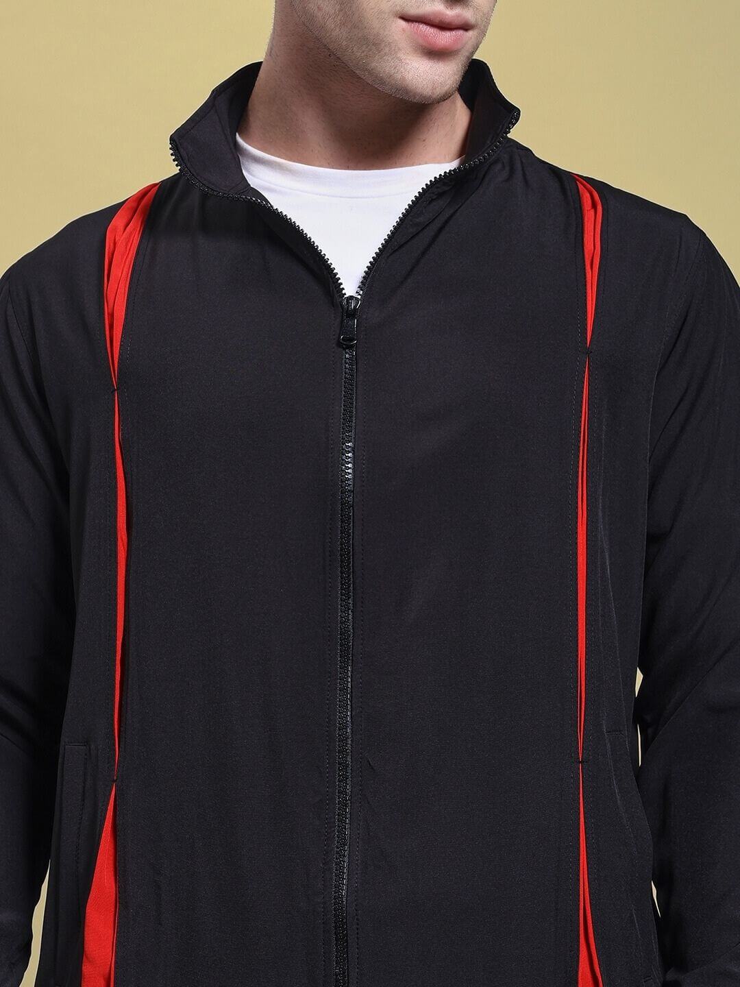 Model wearing UNISON RELAXED FIT CO-ORD SET BLACK RED, showcasing stylish black and red jacket.