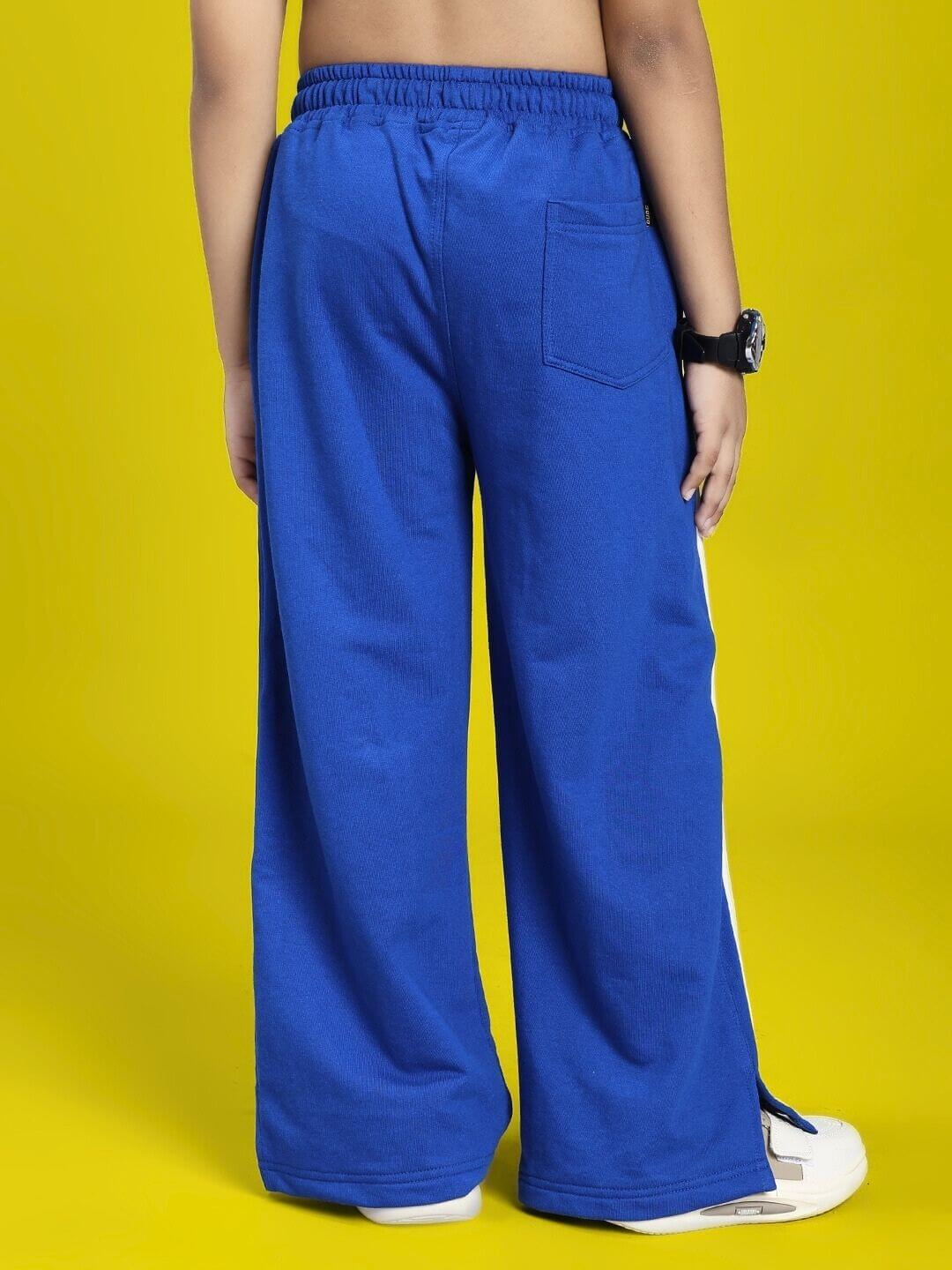 UNITED STRIPE JOGGER FOR BOYS AND GIRLS BLUE showing rear view with white stripe detail.