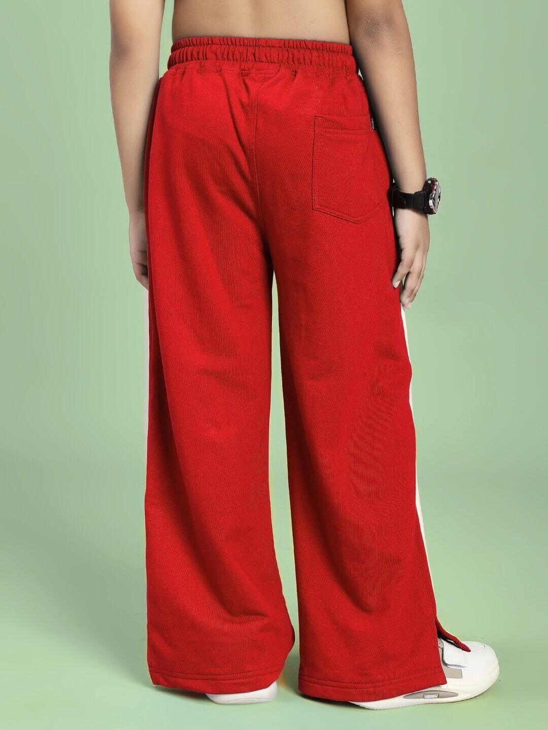 Back view of UNITED STRIPE JOGGER FOR BOYS AND GIRLS RED, showcasing bold red color and comfortable fit.