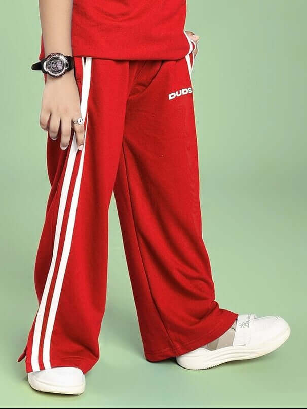 UNITED STRIPE JOGGER FOR BOYS AND GIRLS RED with sporty stripe accents.
