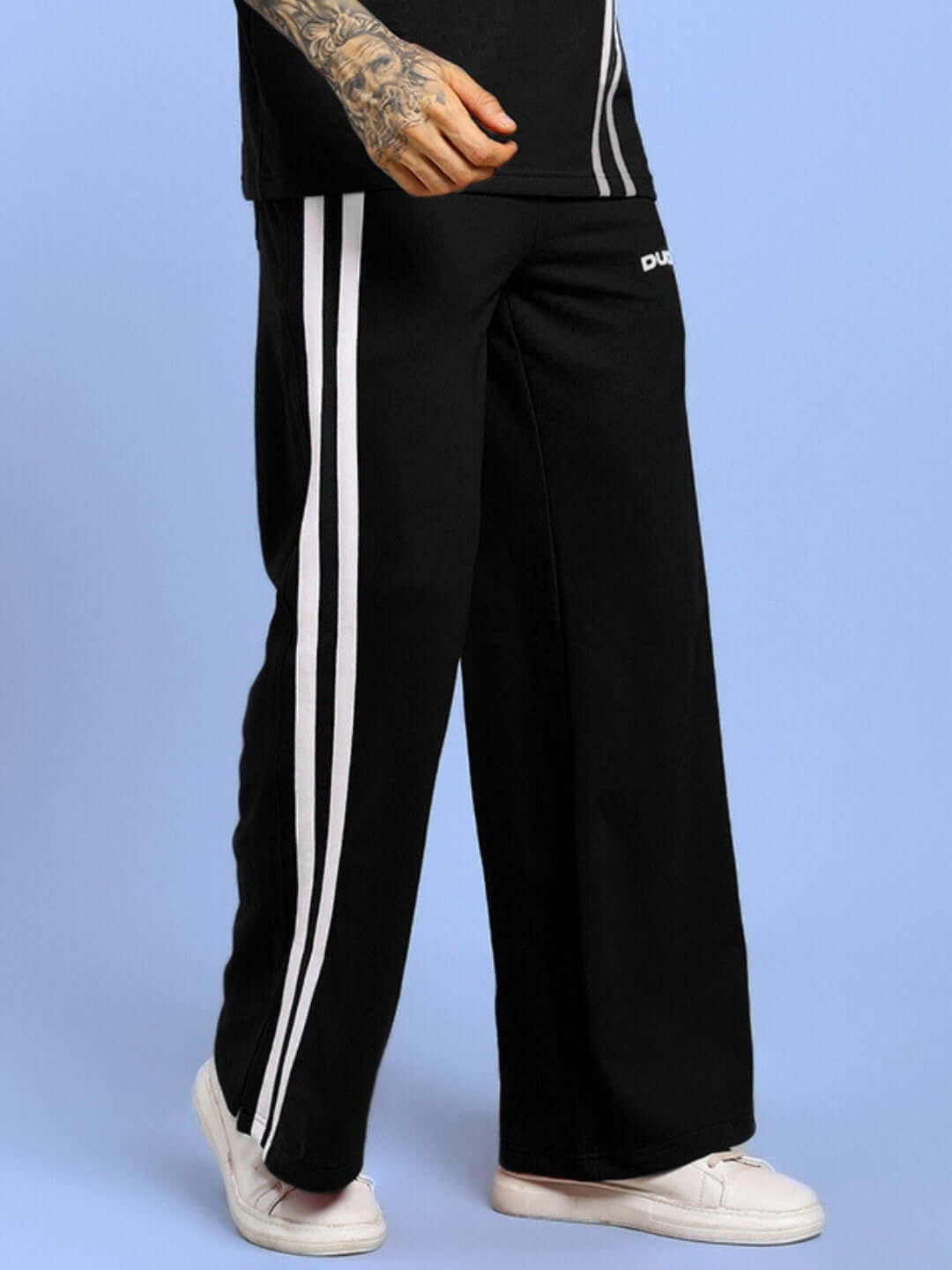 Black joggers with white stripes, made to order by DUDS, customizable size option available.