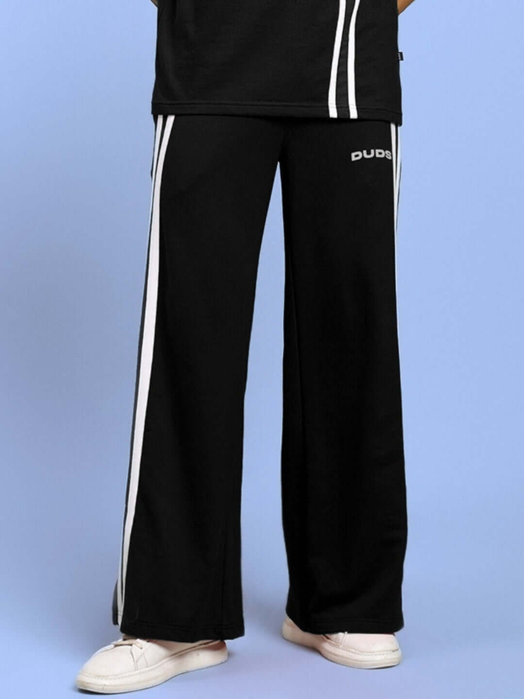 Black United Stripe joggers with white side stripes and DUDS logo, featuring a relaxed fit and customizable size options for a tailored fit.
