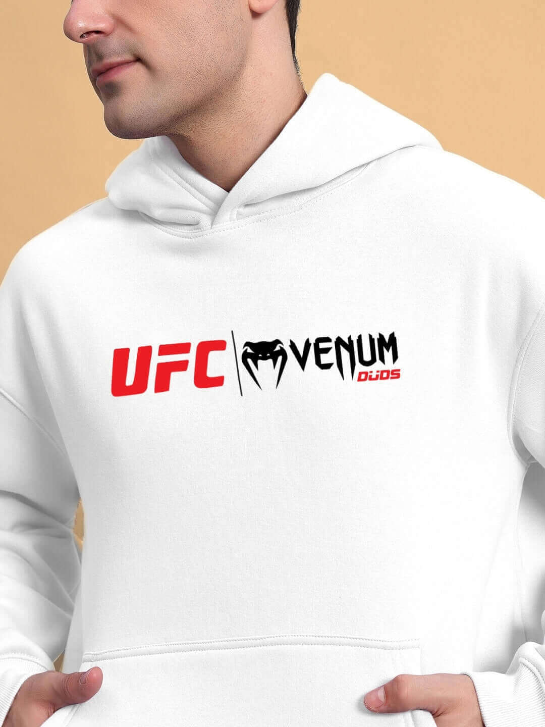 Person wearing WEARDUDS VENUM FLEECE CO-ORD WHITE hoodie with UFC Venum logo.